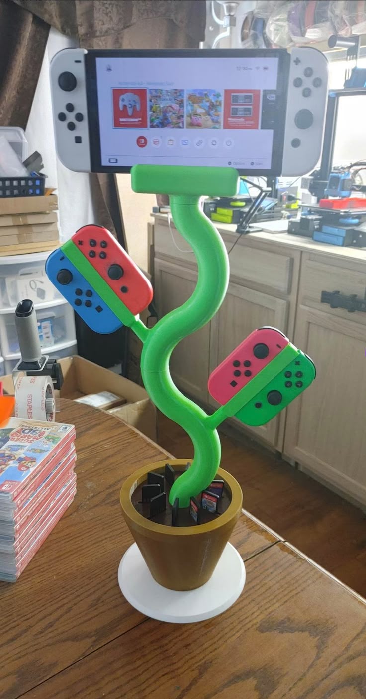 15 Gaming Gadgets You Need to Level Up Your Game (You Have to See #2!) - 4. Playful Plant Stand for Switch